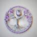 A basic front view of tree of life charm. There are no background props.